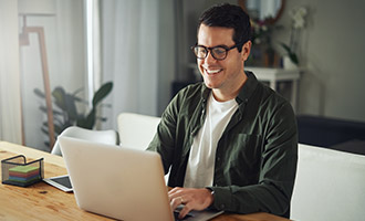 Person on the computer visiting the AIS blog